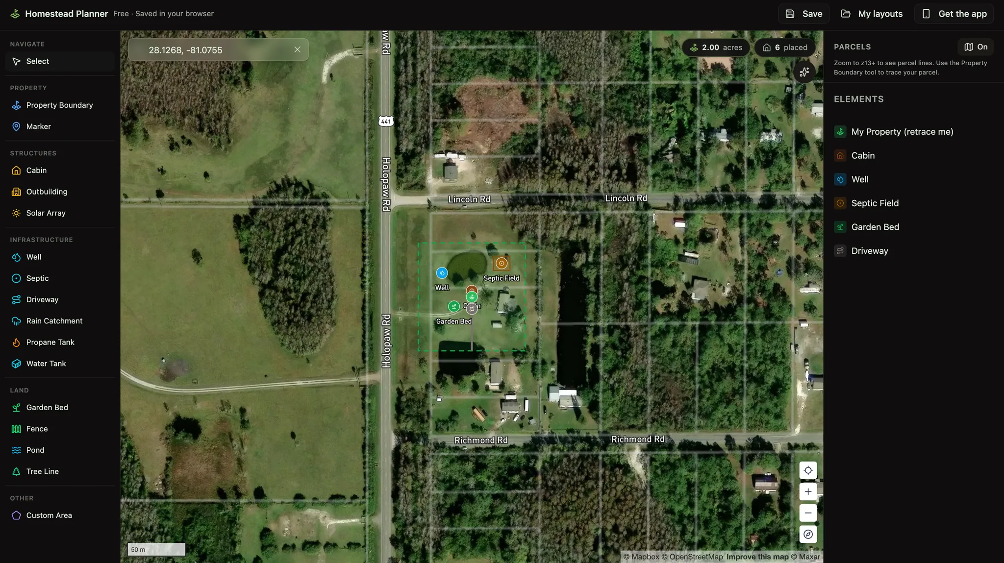 The homestead planner: a 2-acre property boundary traced on satellite imagery with a cabin, well, septic field, garden bed, and driveway placed, the element palette on the left and the parcel overlay switched on